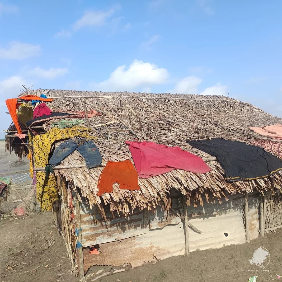 Traditional village house built with Nypa palm leaves in the Sundarbans.