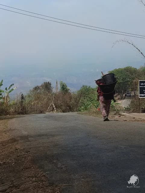 Tribal women walking along a road in Bandarban
